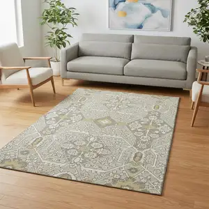 Photo of Ivory Gold And Gray Floral Washable Area Rug With UV Protection