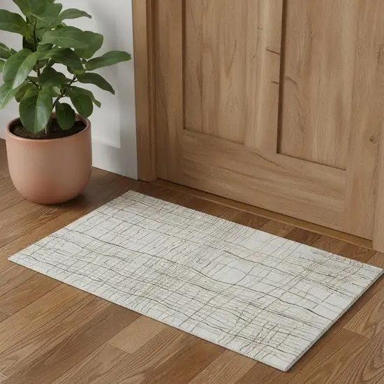 Ivory Gold And Gray Striped Washable Area Rug With UV Protection Photo 1