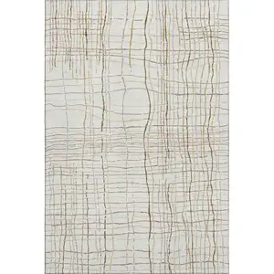 Photo of Ivory Gold And Gray Striped Washable Area Rug With UV Protection