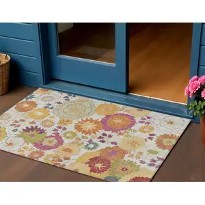 Photo of Ivory Gold And Pink Floral Washable Indoor Outdoor Area Rug