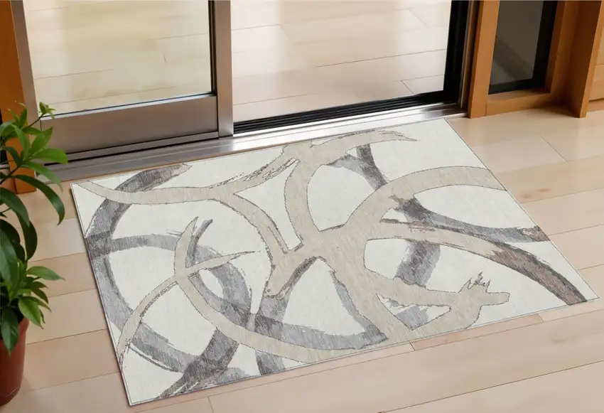 Ivory Gray And Beige Abstract Washable Indoor Outdoor Area Rug Photo 1