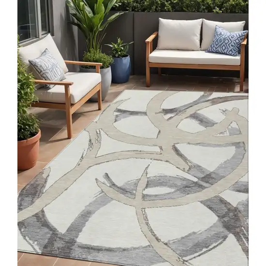 Ivory Gray And Beige Abstract Washable Indoor Outdoor Area Rug Photo 1