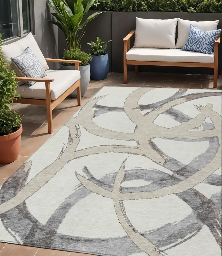 Ivory Gray And Beige Abstract Washable Indoor Outdoor Area Rug Photo 1