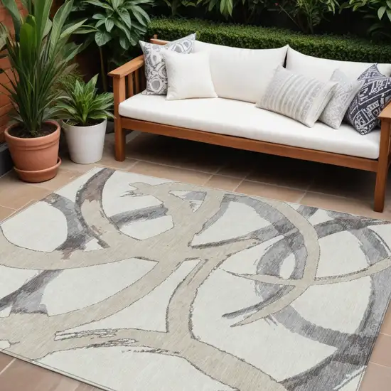 Ivory Gray And Beige Abstract Washable Indoor Outdoor Area Rug Photo 1