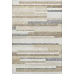 Photo of Ivory Gray And Beige Striped Washable Area Rug With UV Protection