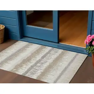 Photo of Ivory Gray And Beige Striped Washable Indoor Outdoor Area Rug