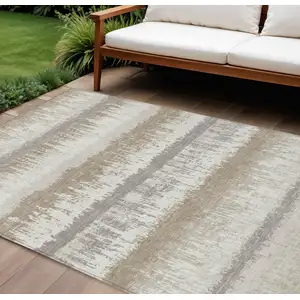 Photo of Ivory Gray And Beige Striped Washable Indoor Outdoor Area Rug