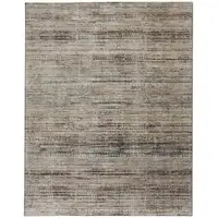 Photo of Ivory Gray And Black Abstract Distressed Area Rug With Fringe