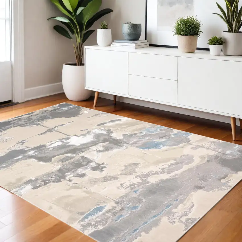 Gray Ivory And Blue Abstract Area Rug Photo 1