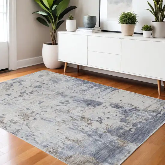 Ivory Gray And Blue Abstract Distressed Area Rug Photo 1