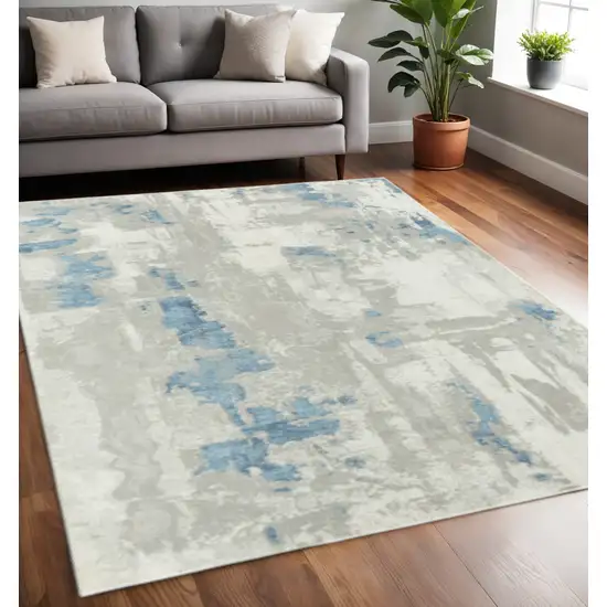 Ivory Gray And Blue Abstract Power Loom Stain Resistant Area Rug Photo 1