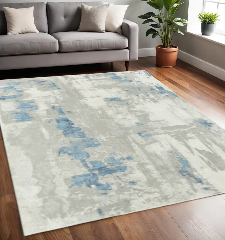 Ivory Gray And Blue Abstract Power Loom Stain Resistant Area Rug Photo 1