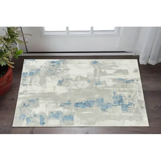 Ivory Gray And Blue Abstract Stain Resistant Area Rug Photo 1