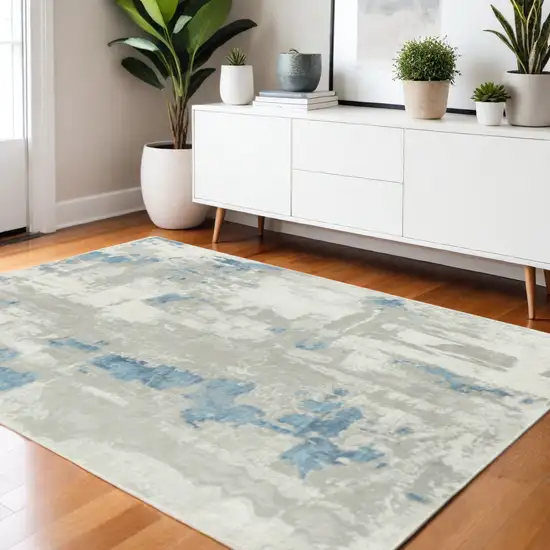 Ivory Gray And Blue Abstract Stain Resistant Area Rug Photo 1