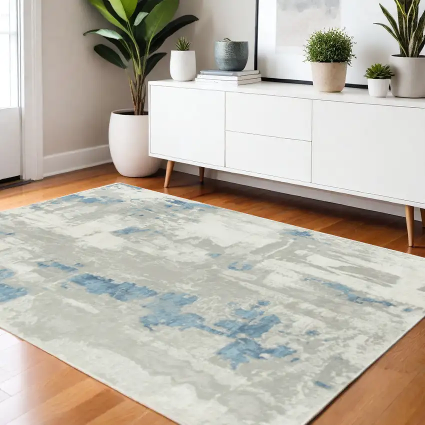 Ivory Gray And Blue Abstract Stain Resistant Area Rug Photo 1