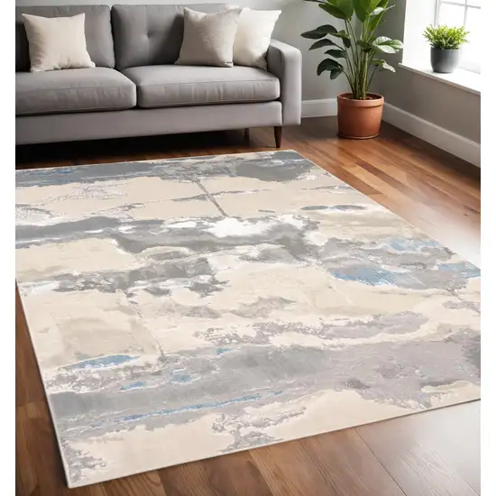 Gray Ivory And Blue Abstract Area Rug Photo 1
