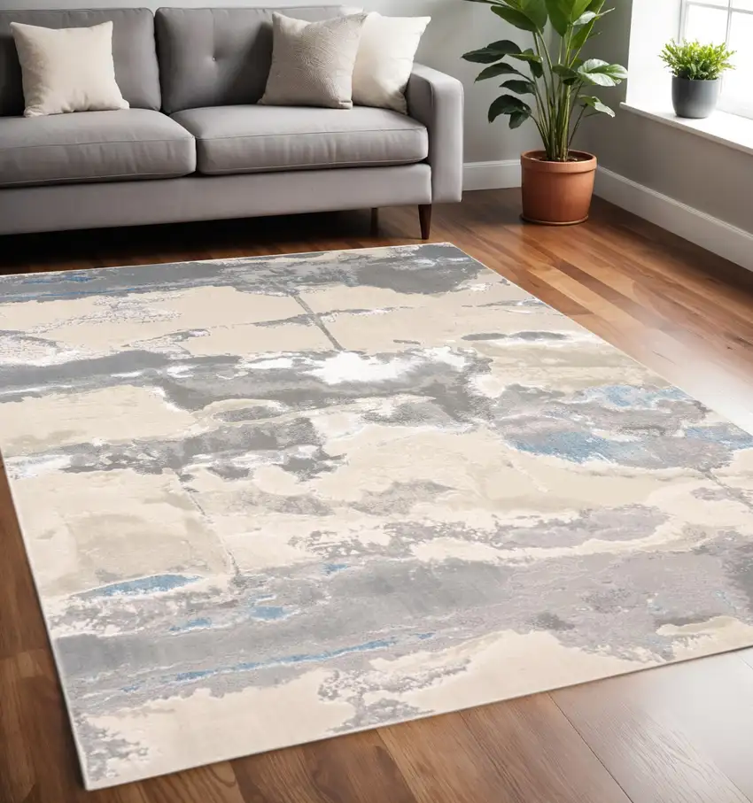 Gray Ivory And Blue Abstract Area Rug Photo 1