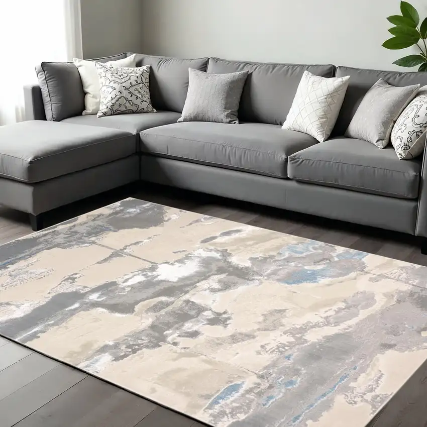 Gray Ivory And Blue Abstract Area Rug Photo 1
