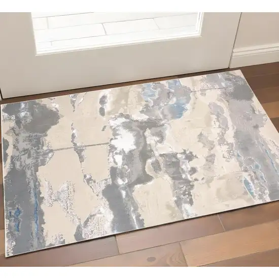 Gray Ivory And Blue Abstract Area Rug Photo 1