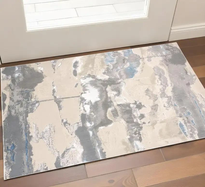 Gray Ivory And Blue Abstract Area Rug Photo 1