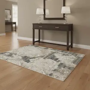 Photo of Ivory Gray And Charcoal Floral Distressed Non Skid Area Rug