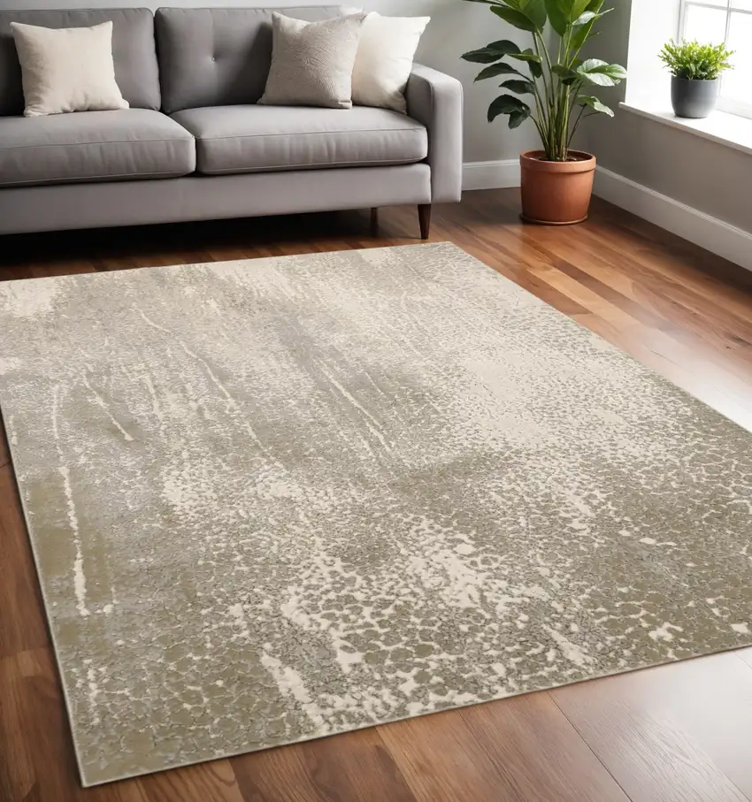 Gold Gray And Ivory Abstract Area Rug Photo 1