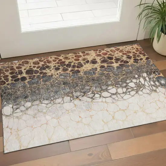 Ivory Gray And Gold Abstract Washable Area Rug With UV Protection Photo 1