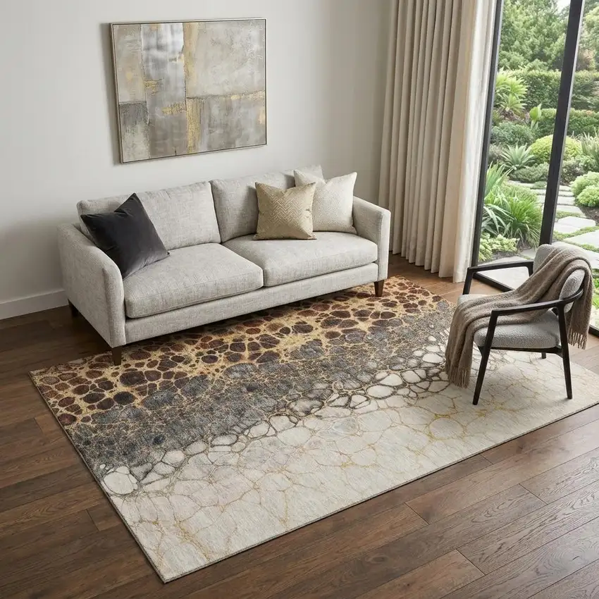 Ivory Gray And Gold Abstract Distressed Washable Area Rug With UV Protection Photo 1