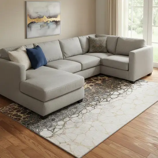 Ivory Gray And Gold Abstract Washable Area Rug With UV Protection Photo 1