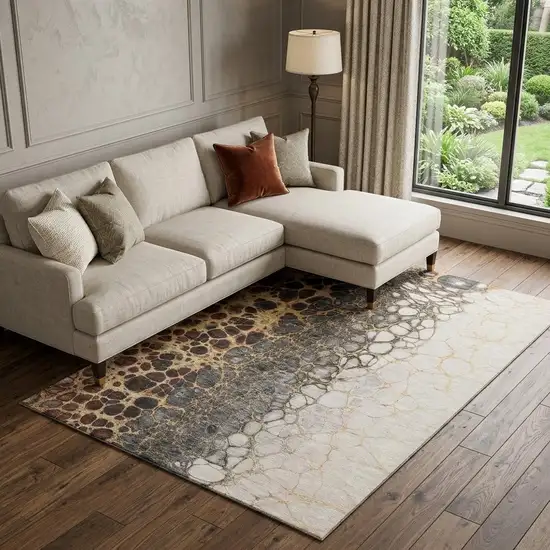 Ivory Gray And Gold Abstract Distressed Washable Area Rug With UV Protection Photo 1