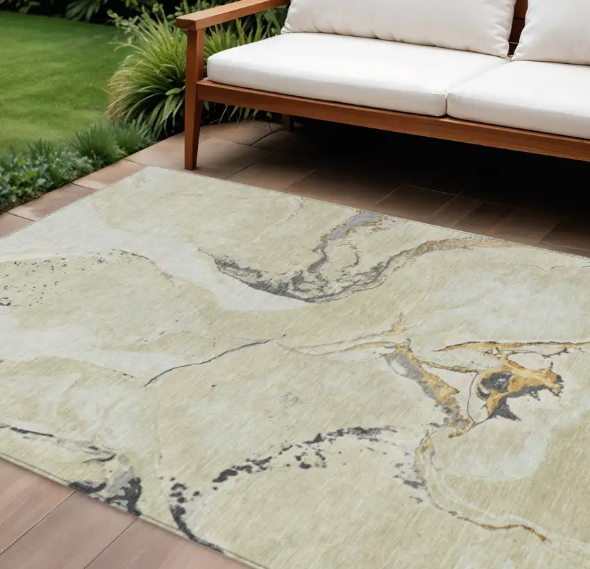 Ivory Gray And Gold Abstract Washable Indoor Outdoor Area Rug Photo 1