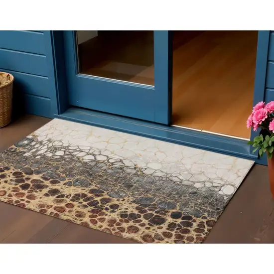 Ivory Gray And Gold Abstract Washable Indoor Outdoor Area Rug Photo 1
