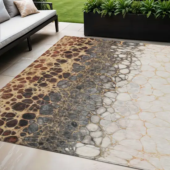 Ivory Gray And Gold Abstract Washable Indoor Outdoor Area Rug Photo 1