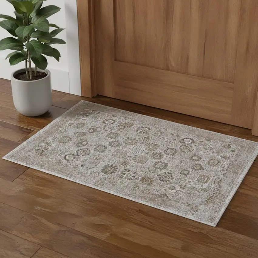Ivory Gray And Gold Floral Area Rug With Fringe Photo 1