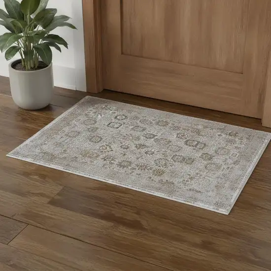 Ivory Gray And Gold Floral Area Rug With Fringe Photo 1