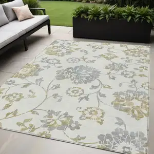 Photo of Ivory Gray And Gold Floral Washable Indoor Outdoor Area Rug