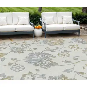 Photo of Ivory Gray And Gold Floral Washable Indoor Outdoor Area Rug