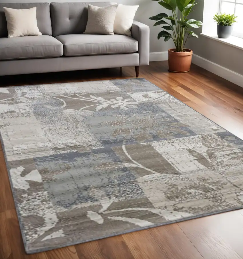 Gray And Ivory Floral Distressed Area Rug Photo 1