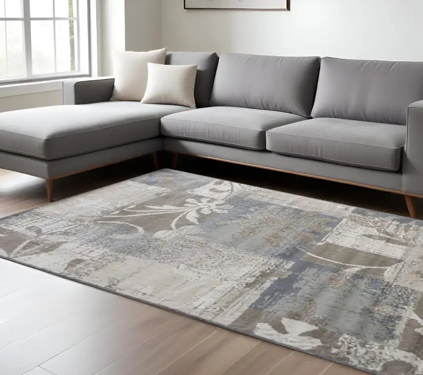 Gray And Ivory Floral Distressed Area Rug Photo 1
