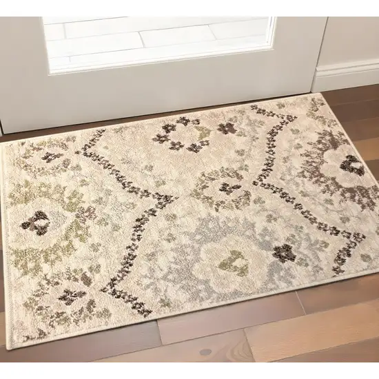 Ivory And Gray Floral Distressed Area Rug Photo 1