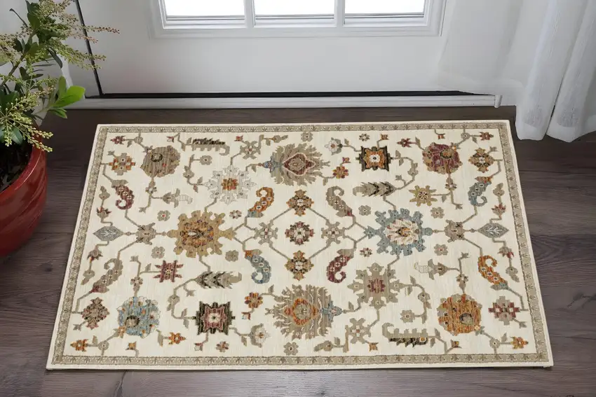 Ivory Gray And Orange Oriental Area Rug Photo 1