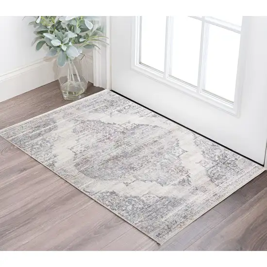 Gray and Ivory Abstract Distressed Area Rug With Fringe Photo 1