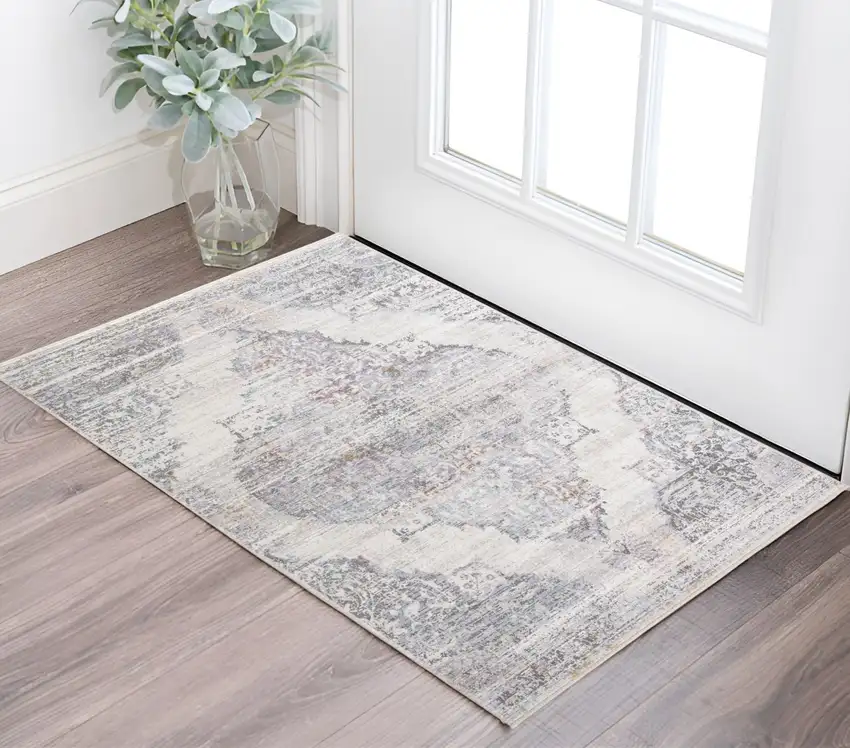 Gray and Ivory Abstract Distressed Area Rug With Fringe Photo 1