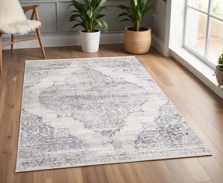 Gray and Ivory Abstract Distressed Area Rug With Fringe Photo 1