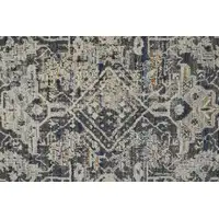 Photo of Ivory Gray And Taupe Abstract Power Loom Distressed Area Rug With Fringe