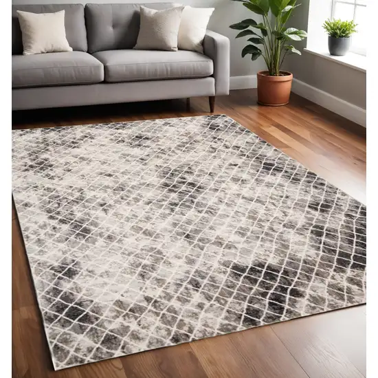 Ivory Gray And Taupe Abstract Stain Resistant Area Rug Photo 1