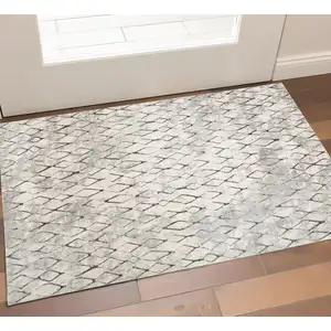 Photo of Ivory Gray And Taupe Abstract Stain Resistant Area Rug