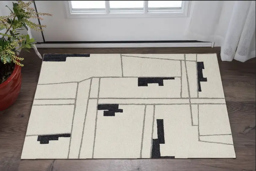 Gray and Ivory Wool Abstract Hand Tufted Area Rug Photo 1