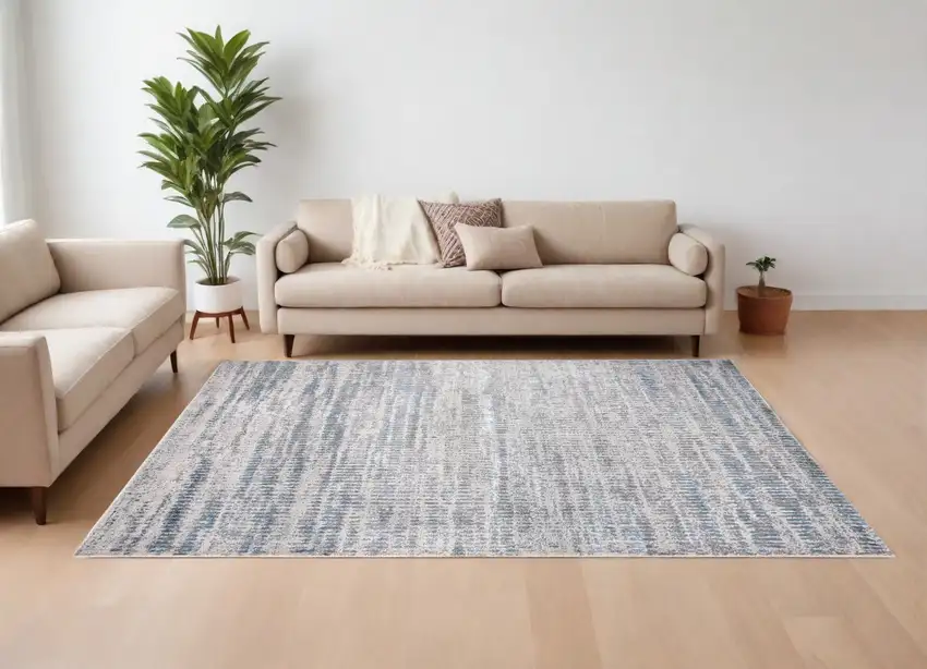 Ivory Gray and Blue Abstract Power Loom Area Rug Photo 1