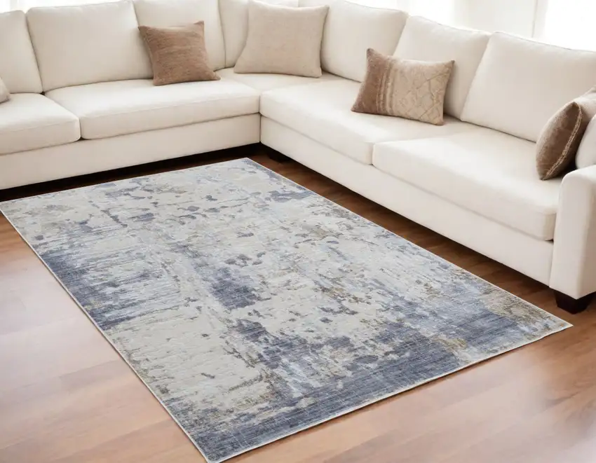 Ivory Gray and Blue Abstract Power Loom Worn Faded Area Rug Photo 1